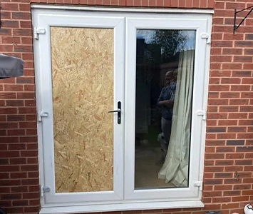 House burgled in Leeds with patio door boarded up