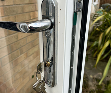 uPVC patio door with replacement handle, look and key