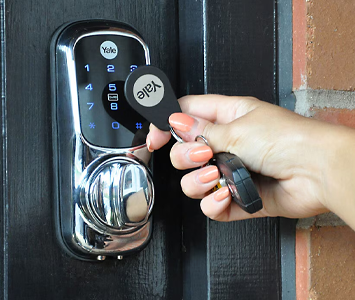 Women accessing her home via a smart lock